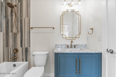 Welcome to 355 S Middleton Dr NW, a stunning new construction on Brunswick Plantation and Golf Resorts in North Carolina - for sale on GolfHomes.com, golf home, golf lot