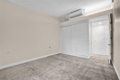 Welcome to this charming expanded 1-bedroom, 1-bathroom home on Leisure World Seal Beach Golf Course in California - for sale on GolfHomes.com, golf home, golf lot