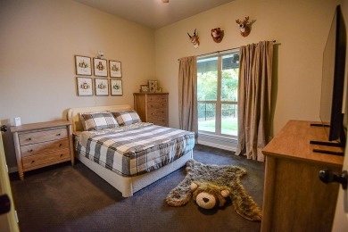 Welcome home to this charming 4-bedroom, 2-bathroom residence on Sugar Tree Golf and Country Club in Texas - for sale on GolfHomes.com, golf home, golf lot