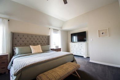 Welcome home to this charming 4-bedroom, 2-bathroom residence on Sugar Tree Golf and Country Club in Texas - for sale on GolfHomes.com, golf home, golf lot