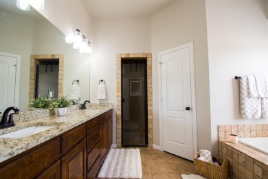 Welcome home to this charming 4-bedroom, 2-bathroom residence on Sugar Tree Golf and Country Club in Texas - for sale on GolfHomes.com, golf home, golf lot