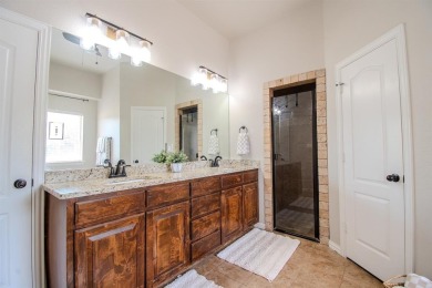 Welcome home to this charming 4-bedroom, 2-bathroom residence on Sugar Tree Golf and Country Club in Texas - for sale on GolfHomes.com, golf home, golf lot