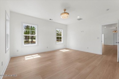Welcome to 355 S Middleton Dr NW, a stunning new construction on Brunswick Plantation and Golf Resorts in North Carolina - for sale on GolfHomes.com, golf home, golf lot