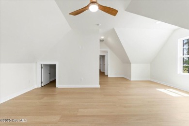 Welcome to 355 S Middleton Dr NW, a stunning new construction on Brunswick Plantation and Golf Resorts in North Carolina - for sale on GolfHomes.com, golf home, golf lot