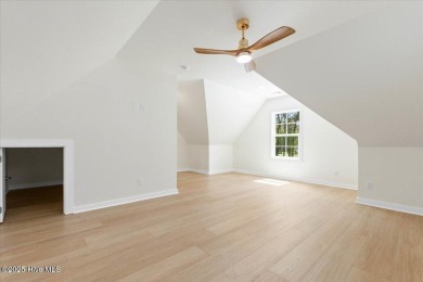 Welcome to 355 S Middleton Dr NW, a stunning new construction on Brunswick Plantation and Golf Resorts in North Carolina - for sale on GolfHomes.com, golf home, golf lot