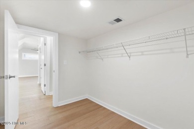 Welcome to 355 S Middleton Dr NW, a stunning new construction on Brunswick Plantation and Golf Resorts in North Carolina - for sale on GolfHomes.com, golf home, golf lot