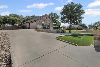 Welcome to this meticulously maintained, single-story on Pecan Plantation Country Club in Texas - for sale on GolfHomes.com, golf home, golf lot