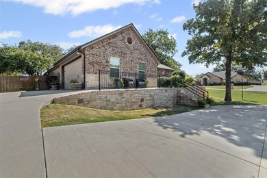 Welcome to this meticulously maintained, single-story on Pecan Plantation Country Club in Texas - for sale on GolfHomes.com, golf home, golf lot