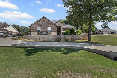 Welcome to this meticulously maintained, single-story on Pecan Plantation Country Club in Texas - for sale on GolfHomes.com, golf home, golf lot