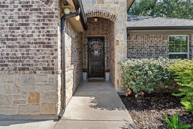 Welcome to this meticulously maintained, single-story on Pecan Plantation Country Club in Texas - for sale on GolfHomes.com, golf home, golf lot