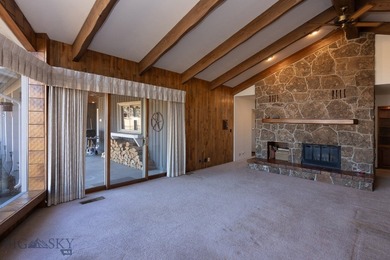 Spectacular views of the Bridger Mountain Range from this home on Riverside Country Club in Montana - for sale on GolfHomes.com, golf home, golf lot