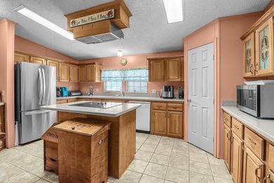 HOME, BOAT , GOLF CART AND MULTIPLE STORAGE BUILDINGS CAN BE ALL on Sapelo Hammock Golf Club in Georgia - for sale on GolfHomes.com, golf home, golf lot