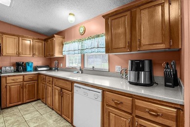 HOME, BOAT , GOLF CART AND MULTIPLE STORAGE BUILDINGS CAN BE ALL on Sapelo Hammock Golf Club in Georgia - for sale on GolfHomes.com, golf home, golf lot