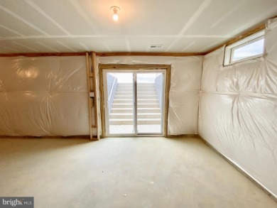 MOVE IN READY-UNFINISHED BASEMENT!  Photos are of actual home! on Plantation Lakes Golf and Country Club in Delaware - for sale on GolfHomes.com, golf home, golf lot