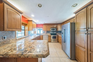 Charming 3 bedroom, 2 bathroom CBS construction home located on Club Med Sandpiper in Florida - for sale on GolfHomes.com, golf home, golf lot