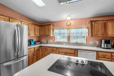 HOME, BOAT , GOLF CART AND MULTIPLE STORAGE BUILDINGS CAN BE ALL on Sapelo Hammock Golf Club in Georgia - for sale on GolfHomes.com, golf home, golf lot