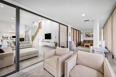 Entry is secured, visitors must provide the address 22627 on Boca Pointe Country Club in Florida - for sale on GolfHomes.com, golf home, golf lot