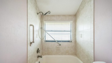 Charming 3 bedroom, 2 bathroom CBS construction home located on Club Med Sandpiper in Florida - for sale on GolfHomes.com, golf home, golf lot