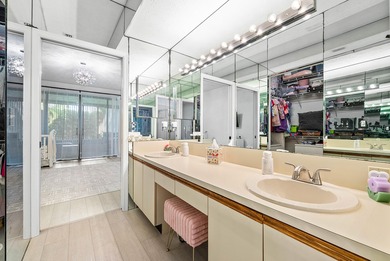 Entry is secured, visitors must provide the address 22627 on Boca Pointe Country Club in Florida - for sale on GolfHomes.com, golf home, golf lot