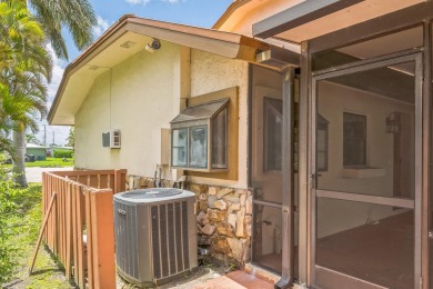 Charming 3 bedroom, 2 bathroom CBS construction home located on Club Med Sandpiper in Florida - for sale on GolfHomes.com, golf home, golf lot