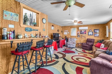 HOME, BOAT , GOLF CART AND MULTIPLE STORAGE BUILDINGS CAN BE ALL on Sapelo Hammock Golf Club in Georgia - for sale on GolfHomes.com, golf home, golf lot