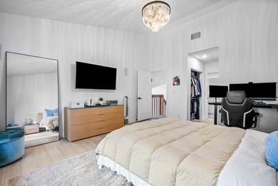 Entry is secured, visitors must provide the address 22627 on Boca Pointe Country Club in Florida - for sale on GolfHomes.com, golf home, golf lot