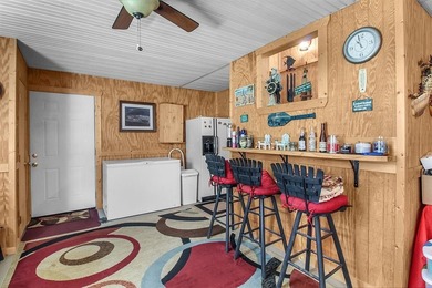 HOME, BOAT , GOLF CART AND MULTIPLE STORAGE BUILDINGS CAN BE ALL on Sapelo Hammock Golf Club in Georgia - for sale on GolfHomes.com, golf home, golf lot