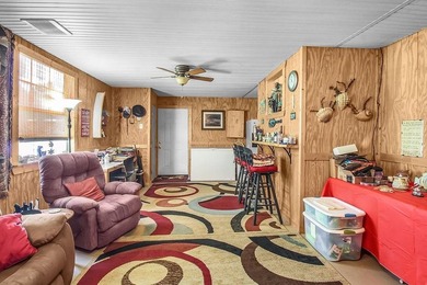 HOME, BOAT , GOLF CART AND MULTIPLE STORAGE BUILDINGS CAN BE ALL on Sapelo Hammock Golf Club in Georgia - for sale on GolfHomes.com, golf home, golf lot