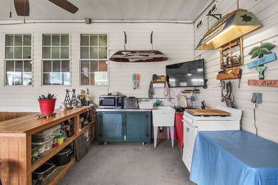 HOME, BOAT , GOLF CART AND MULTIPLE STORAGE BUILDINGS CAN BE ALL on Sapelo Hammock Golf Club in Georgia - for sale on GolfHomes.com, golf home, golf lot