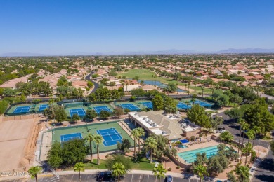 Lock and go living at its best in this 2BR, 2BA Naples villa on Oakwood Golf Club  in Arizona - for sale on GolfHomes.com, golf home, golf lot