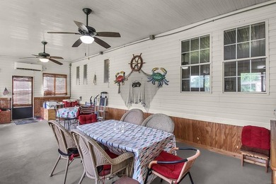 HOME, BOAT , GOLF CART AND MULTIPLE STORAGE BUILDINGS CAN BE ALL on Sapelo Hammock Golf Club in Georgia - for sale on GolfHomes.com, golf home, golf lot