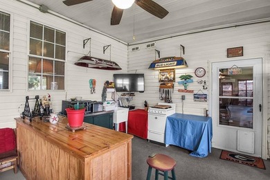 HOME, BOAT , GOLF CART AND MULTIPLE STORAGE BUILDINGS CAN BE ALL on Sapelo Hammock Golf Club in Georgia - for sale on GolfHomes.com, golf home, golf lot