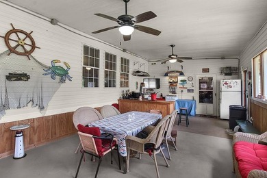 HOME, BOAT , GOLF CART AND MULTIPLE STORAGE BUILDINGS CAN BE ALL on Sapelo Hammock Golf Club in Georgia - for sale on GolfHomes.com, golf home, golf lot