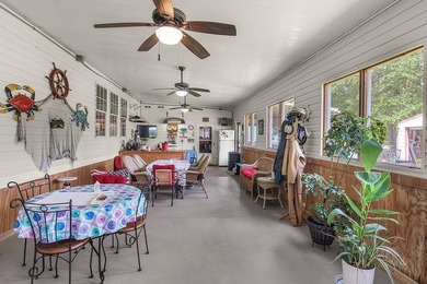 HOME, BOAT , GOLF CART AND MULTIPLE STORAGE BUILDINGS CAN BE ALL on Sapelo Hammock Golf Club in Georgia - for sale on GolfHomes.com, golf home, golf lot