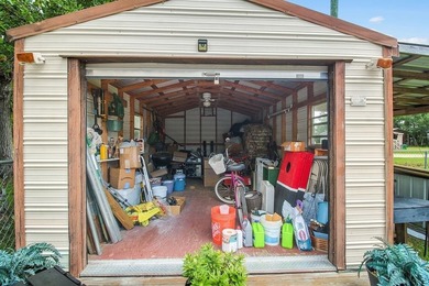 HOME, BOAT , GOLF CART AND MULTIPLE STORAGE BUILDINGS CAN BE ALL on Sapelo Hammock Golf Club in Georgia - for sale on GolfHomes.com, golf home, golf lot