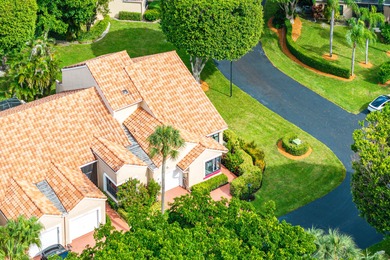 Entry is secured, visitors must provide the address 22627 on Boca Pointe Country Club in Florida - for sale on GolfHomes.com, golf home, golf lot
