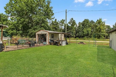 HOME, BOAT , GOLF CART AND MULTIPLE STORAGE BUILDINGS CAN BE ALL on Sapelo Hammock Golf Club in Georgia - for sale on GolfHomes.com, golf home, golf lot