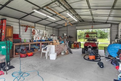 HOME, BOAT , GOLF CART AND MULTIPLE STORAGE BUILDINGS CAN BE ALL on Sapelo Hammock Golf Club in Georgia - for sale on GolfHomes.com, golf home, golf lot