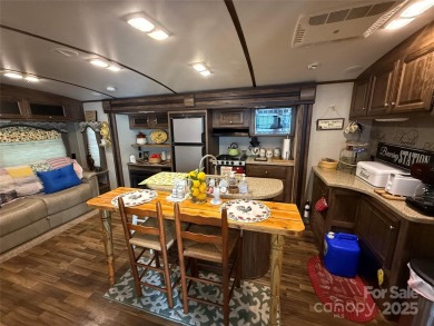 This well appointed unit is ready for the next owners to enjoy on The Tillery Tradition Country Club in North Carolina - for sale on GolfHomes.com, golf home, golf lot