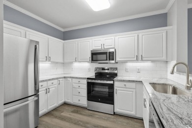 Welcome to this beautiful 3-bedroom, 2-bath condo located in the on Harbour View Par 3 and Driving Range in South Carolina - for sale on GolfHomes.com, golf home, golf lot