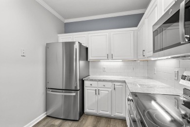 Welcome to this beautiful 3-bedroom, 2-bath condo located in the on Harbour View Par 3 and Driving Range in South Carolina - for sale on GolfHomes.com, golf home, golf lot