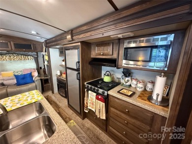 This well appointed unit is ready for the next owners to enjoy on The Tillery Tradition Country Club in North Carolina - for sale on GolfHomes.com, golf home, golf lot