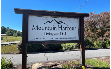 This lot is waiting for you to bring your house plan and begin on Mountain Harbour Golf Club in North Carolina - for sale on GolfHomes.com, golf home, golf lot