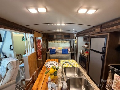 This well appointed unit is ready for the next owners to enjoy on The Tillery Tradition Country Club in North Carolina - for sale on GolfHomes.com, golf home, golf lot
