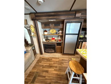 This well appointed unit is ready for the next owners to enjoy on The Tillery Tradition Country Club in North Carolina - for sale on GolfHomes.com, golf home, golf lot