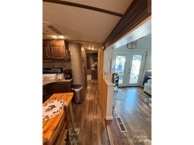 This well appointed unit is ready for the next owners to enjoy on The Tillery Tradition Country Club in North Carolina - for sale on GolfHomes.com, golf home, golf lot