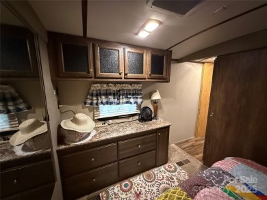 This well appointed unit is ready for the next owners to enjoy on The Tillery Tradition Country Club in North Carolina - for sale on GolfHomes.com, golf home, golf lot