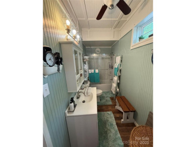 This well appointed unit is ready for the next owners to enjoy on The Tillery Tradition Country Club in North Carolina - for sale on GolfHomes.com, golf home, golf lot