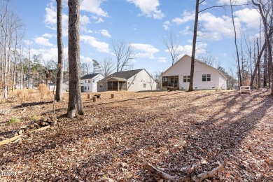 Welcome home to your spacious ranch home in the Golf course on River Golf and County Club at Lake Royale in North Carolina - for sale on GolfHomes.com, golf home, golf lot