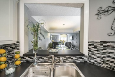 Welcome home to this updated first floor 2 BR/2 BA condo with on Boca Dunes Golf and Country Club in Florida - for sale on GolfHomes.com, golf home, golf lot